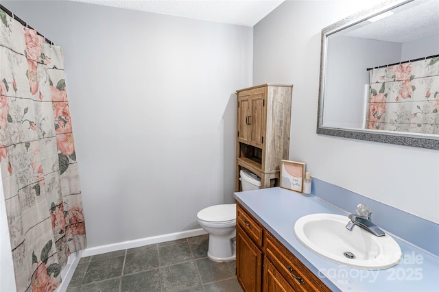 174 Perrin Dr, Mooresville, NC 28117 - bathroom with toilet, vanity, baseboards, tile patterned floors, and a shower with curtain