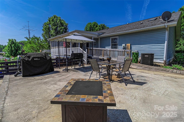 174 Perrin Dr, Mooresville, NC 28117 - view of patio featuring outdoor dining area, grilling area, and central AC unit