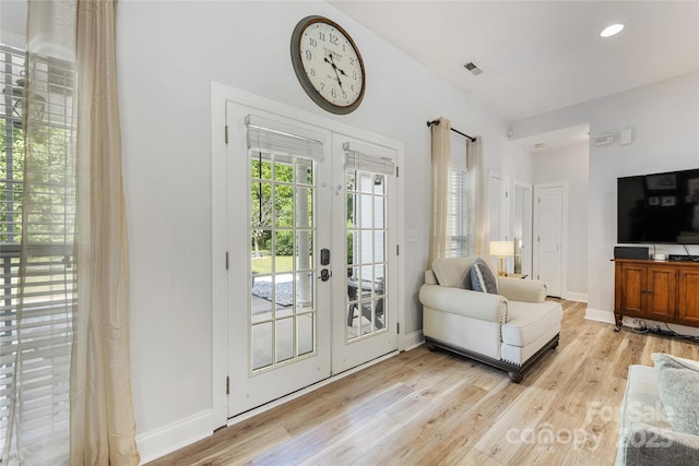 1728 Privette Rd, Matthews, NC 28105 - living room with french doors, light wood-style floors, baseboards, and recessed lighting