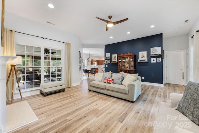 1728 Privette Rd, Matthews, NC 28105 - living room featuring ceiling fan, wood finished floors, baseboards, and recessed lighting