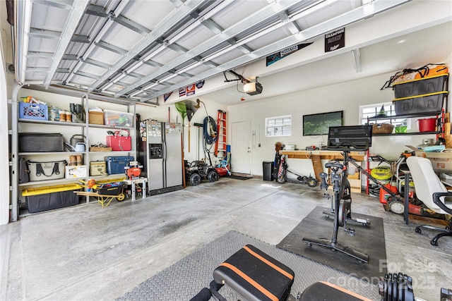 1728 Privette Rd, Matthews, NC 28105 - garage with stainless steel fridge with ice dispenser and a garage door opener