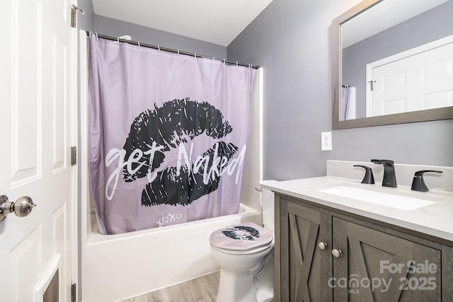 full bathroom with vanity, toilet, shower / bathtub combination with curtain, and wood finished floors
