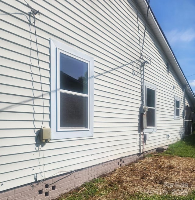 view of home's exterior featuring crawl space