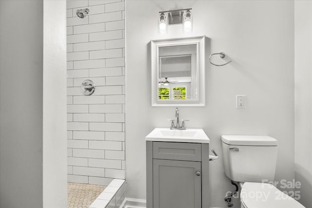 6839 Wagon Oak Rd, Charlotte, NC 28212 - bathroom with vanity, toilet, and a tile shower