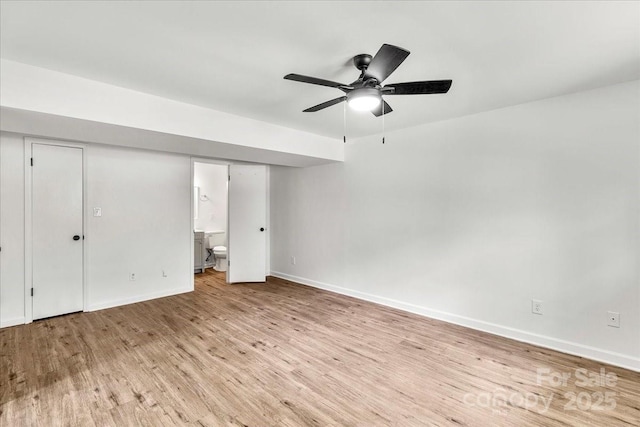 6839 Wagon Oak Rd, Charlotte, NC 28212 - unfurnished bedroom with ensuite bathroom, wood finished floors, baseboards, and ceiling fan