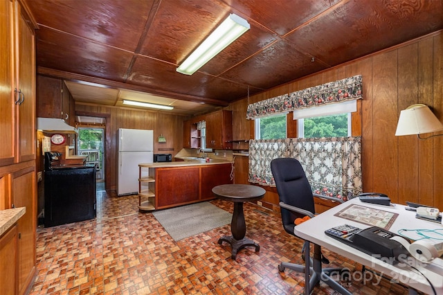 office with a sink, wooden walls, a wealth of natural light, and wooden ceiling
