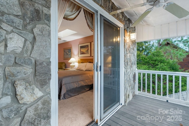 exterior space featuring ceiling fan