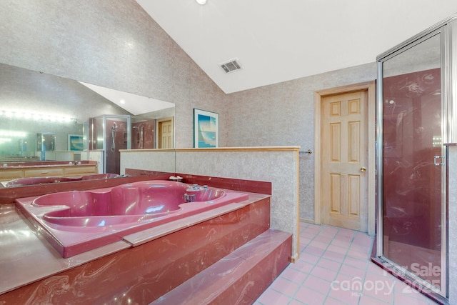 192 Diana Dr, Mount Gilead, NC 27306 - bathroom featuring tile patterned flooring, a stall shower, a bath, and high vaulted ceiling