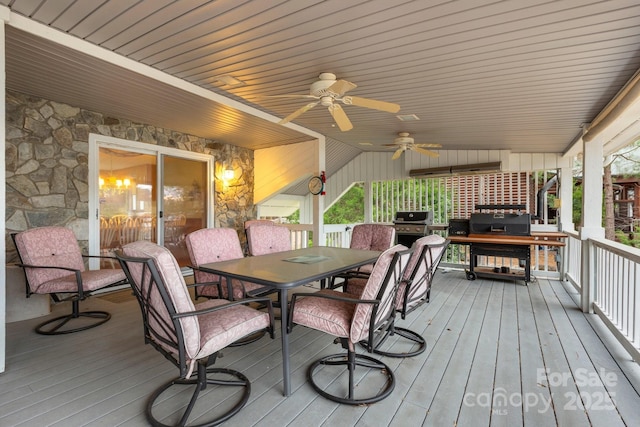 192 Diana Dr, Mount Gilead, NC 27306 - wooden terrace with outdoor dining area, ceiling fan, and a grill