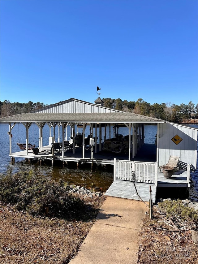 192 Diana Dr, Mount Gilead, NC 27306 - dock area featuring boat lift and a water view
