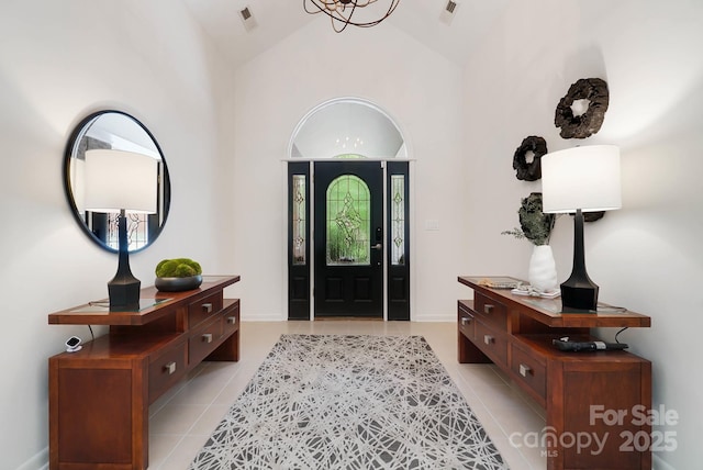 1245 Bellemeade Ln, Charlotte, NC 28270 - entryway featuring light tile patterned floors and vaulted ceiling