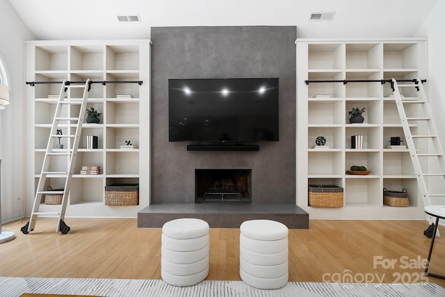 1245 Bellemeade Ln, Charlotte, NC 28270 - unfurnished living room with wood finished floors and a fireplace