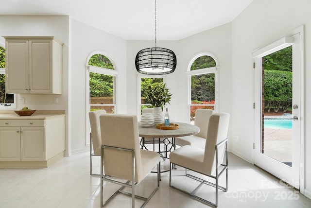 1245 Bellemeade Ln, Charlotte, NC 28270 - dining room with a chandelier and light tile patterned floors
