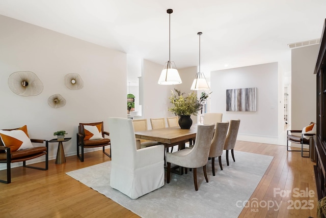 1245 Bellemeade Ln, Charlotte, NC 28270 - dining room with light wood-style floors and baseboards