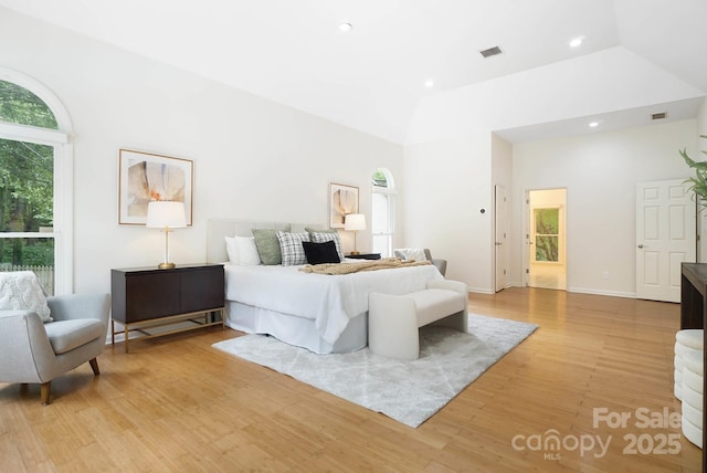 1245 Bellemeade Ln, Charlotte, NC 28270 - bedroom featuring a towering ceiling, light wood-style flooring, and recessed lighting