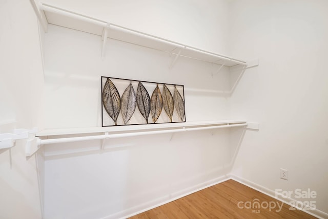 1245 Bellemeade Ln, Charlotte, NC 28270 - spacious closet featuring wood finished floors