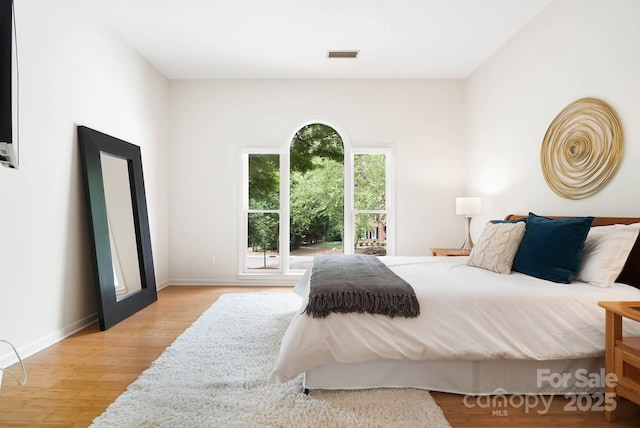 1245 Bellemeade Ln, Charlotte, NC 28270 - bedroom with wood finished floors and baseboards