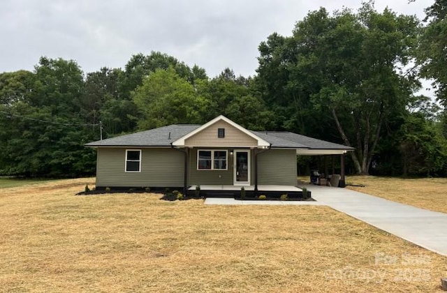 1428 E Main St, Cherryville, NC 28021 - view of front of home featuring concrete driveway and a front lawn