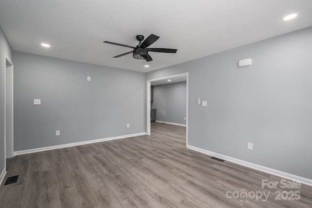1428 E Main St, Cherryville, NC 28021 - empty room featuring ceiling fan, wood finished floors, recessed lighting, and baseboards