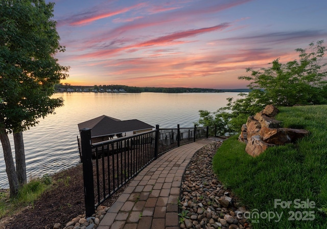 249 Landing Trl, Mount Gilead, NC 27306 - view of dock featuring a water view and fence