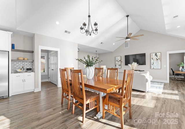249 Landing Trl, Mount Gilead, NC 27306 - dining area featuring baseboards, ceiling fan with notable chandelier, light wood finished floors, and visible vents