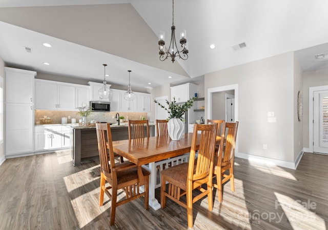 249 Landing Trl, Mount Gilead, NC 27306 - dining space featuring a chandelier, recessed lighting, wood finished floors, and visible vents