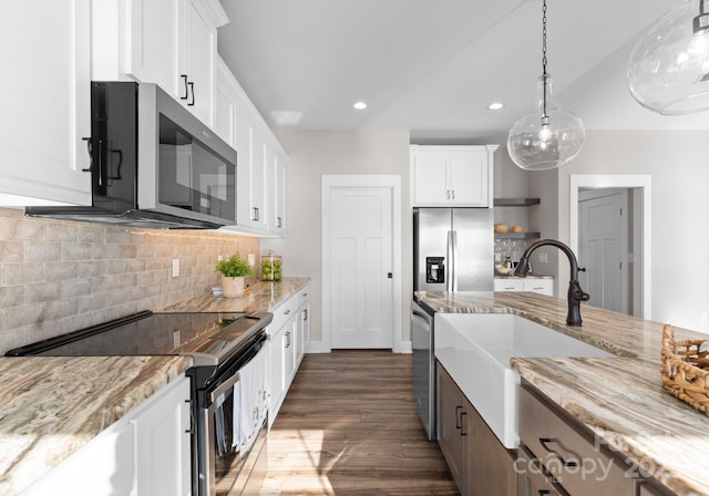 249 Landing Trl, Mount Gilead, NC 27306 - kitchen with appliances with stainless steel finishes, a sink, white cabinets, recessed lighting, and dark wood-type flooring