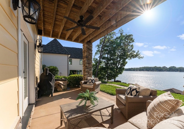 249 Landing Trl, Mount Gilead, NC 27306 - view of patio / terrace featuring a ceiling fan, a water view, and an outdoor living space