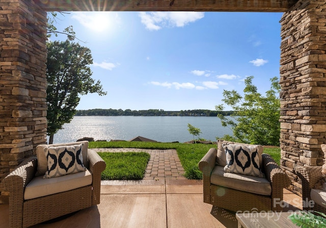 249 Landing Trl, Mount Gilead, NC 27306 - view of patio featuring a water view and an outdoor hangout area