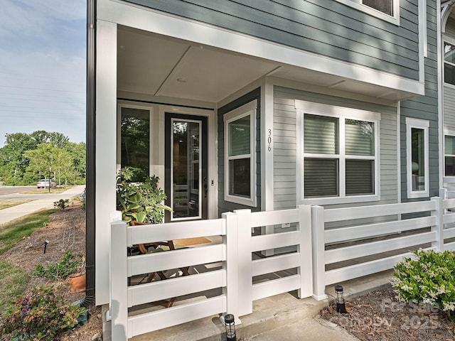 property entrance with fence