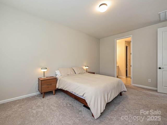 bedroom featuring light carpet, baseboards, and visible vents