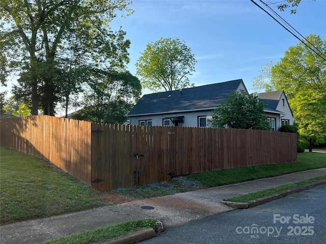 130 Arlington St, Forest City, NC 28043 - view of side of property with a gate