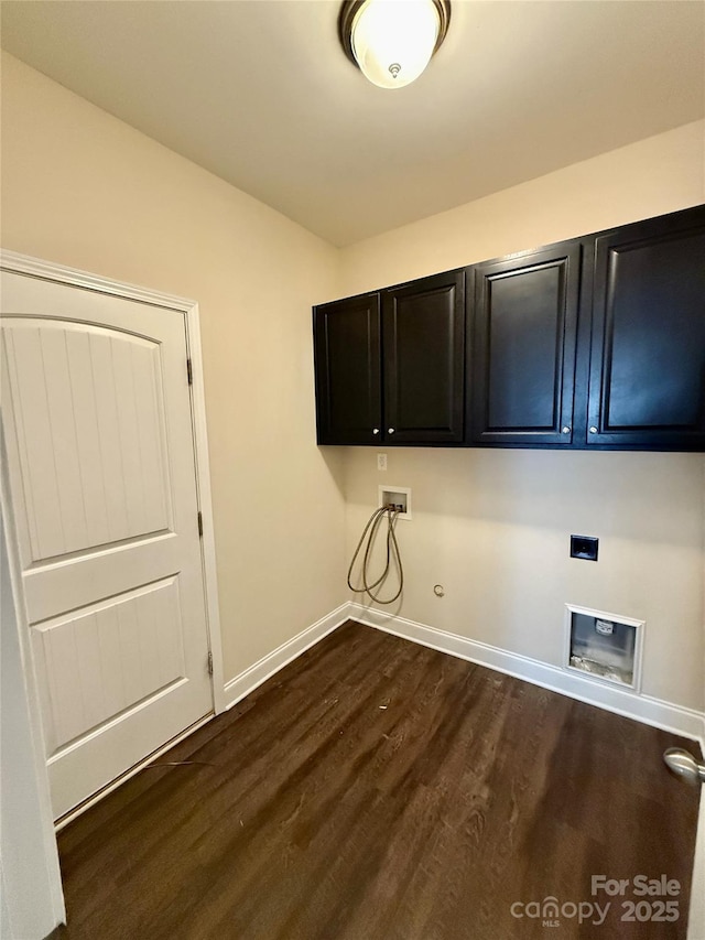 washroom with dark wood-style flooring, baseboards, gas dryer hookup, cabinet space, and washer hookup