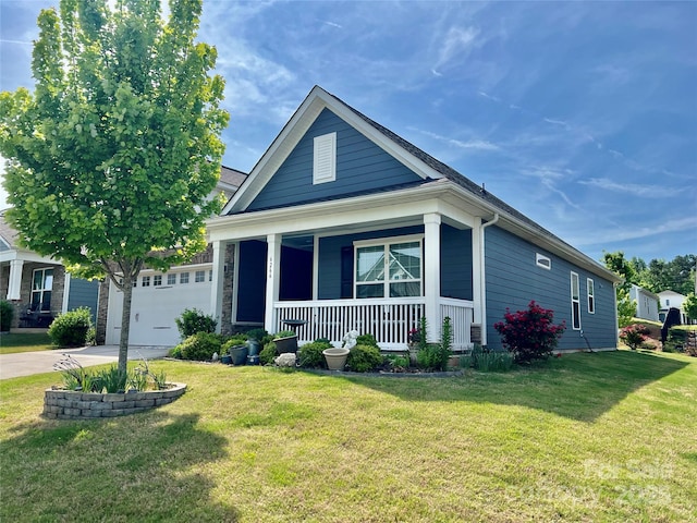6266 Swanport Rd, Lancaster, SC 29720 - view of front of property with covered porch, a front yard, driveway, and a garage