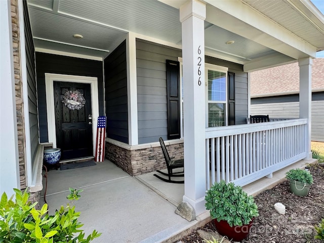 6266 Swanport Rd, Lancaster, SC 29720 - property entrance with a porch and stone siding