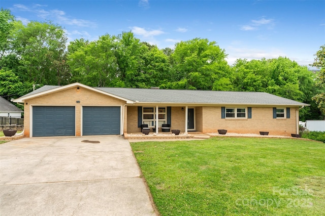 213 Lakeview Dr, Harrisburg, NC 28075 - single story home featuring a garage, brick siding, driveway, a porch, and roof with shingles