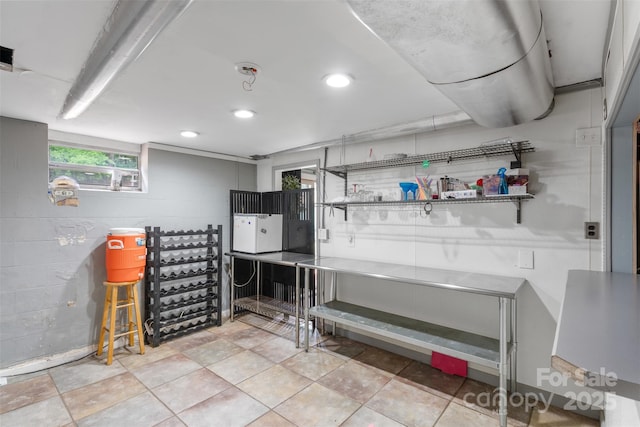 213 Lakeview Dr, Harrisburg, NC 28075 - misc room with concrete block wall and recessed lighting