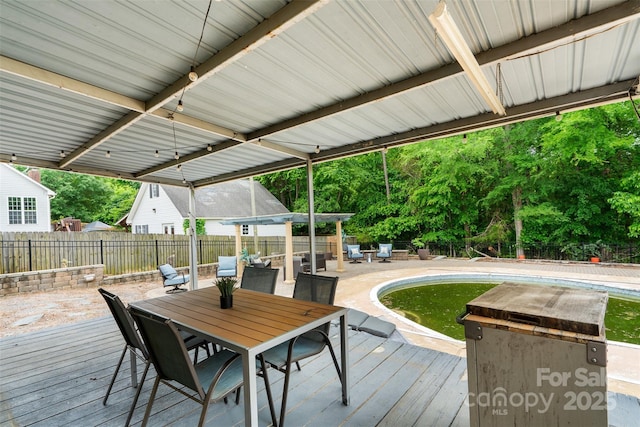 213 Lakeview Dr, Harrisburg, NC 28075 - wooden terrace with a fenced backyard and outdoor dining space