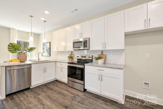 514 Rich St, Rock Hill, SC 29730 - kitchen with a sink, appliances with stainless steel finishes, white cabinets, and visible vents
