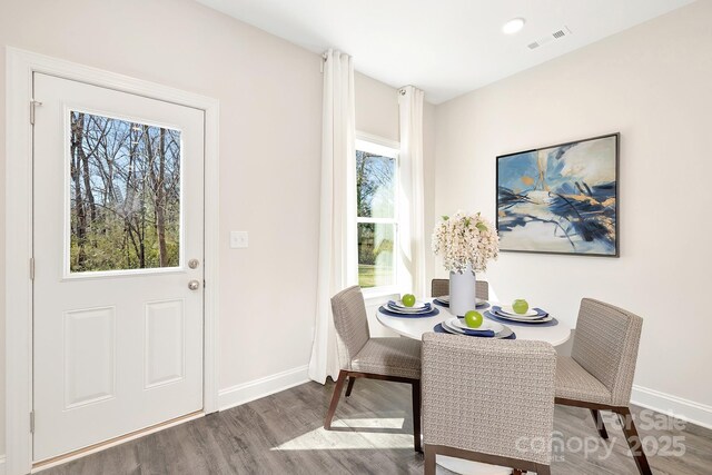 514 Rich St, Rock Hill, SC 29730 - dining space featuring baseboards, wood finished floors, and visible vents