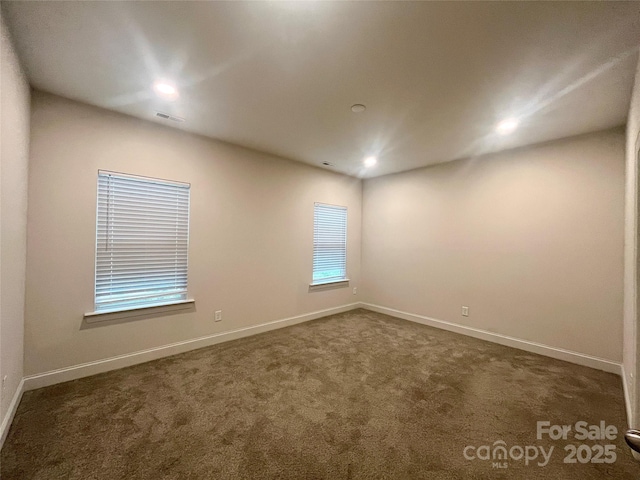 514 Rich St, Rock Hill, SC 29730 - spare room featuring recessed lighting, baseboards, dark colored carpet, and visible vents
