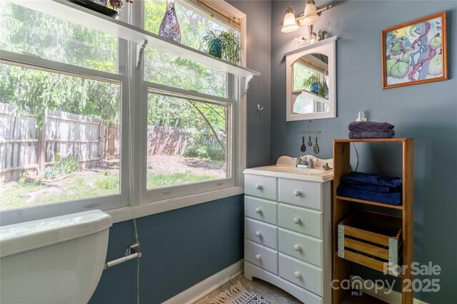 interior space featuring baseboards