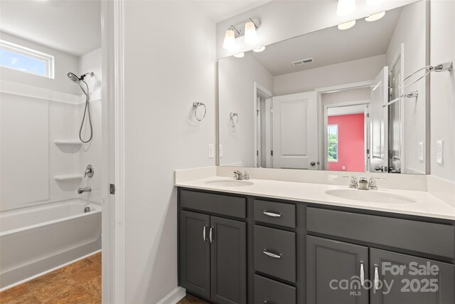 423 Shallowford Dr, Rock Hill, SC 29732 - full bathroom with double vanity, shower / bath combination, and baseboards
