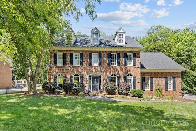 9513 Tresanton Dr, Charlotte, NC 28210 - colonial home featuring a front lawn and brick siding