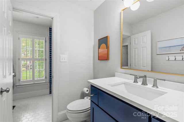 9513 Tresanton Dr, Charlotte, NC 28210 - bathroom featuring vanity, baseboards, toilet, and tile patterned floors