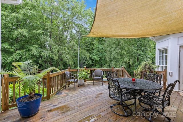 9513 Tresanton Dr, Charlotte, NC 28210 - wooden terrace with outdoor dining area