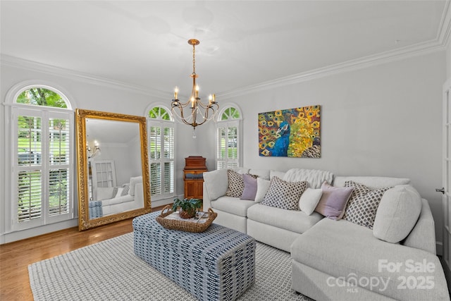 9513 Tresanton Dr, Charlotte, NC 28210 - living room featuring a chandelier, crown molding, and wood finished floors