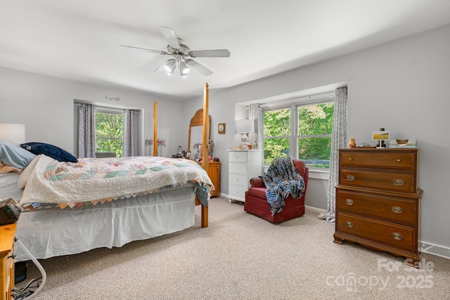701 5th Ave NE, Conover, NC 28613 - bedroom with light colored carpet, ceiling fan, and baseboards