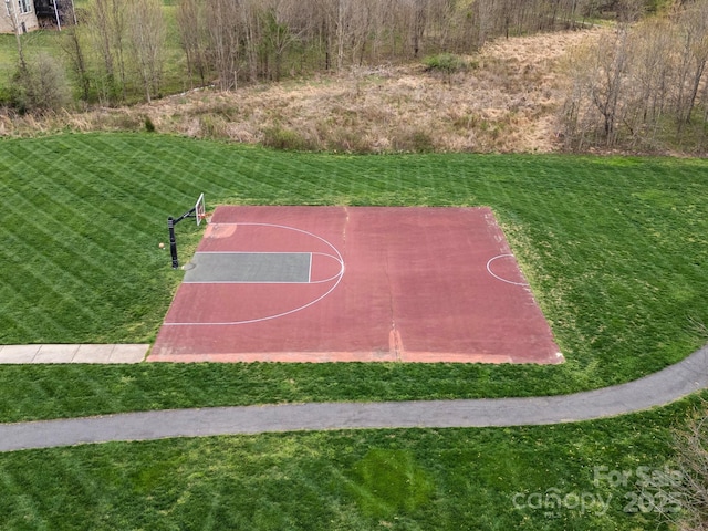 422 Deer Brush Ln, Waxhaw, NC 28173 - view of basketball court with a lawn and basketball hoop
