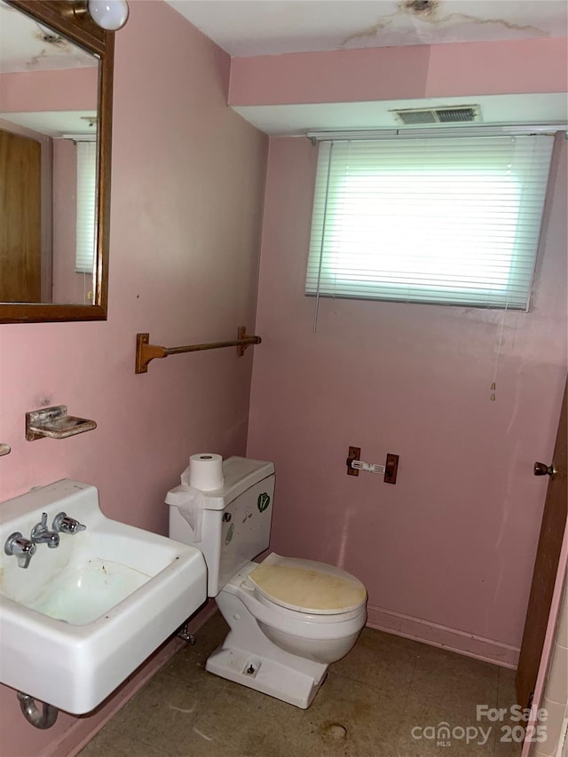 205 Rudolph Rd, Salisbury, NC 28146 - bathroom with toilet and a sink